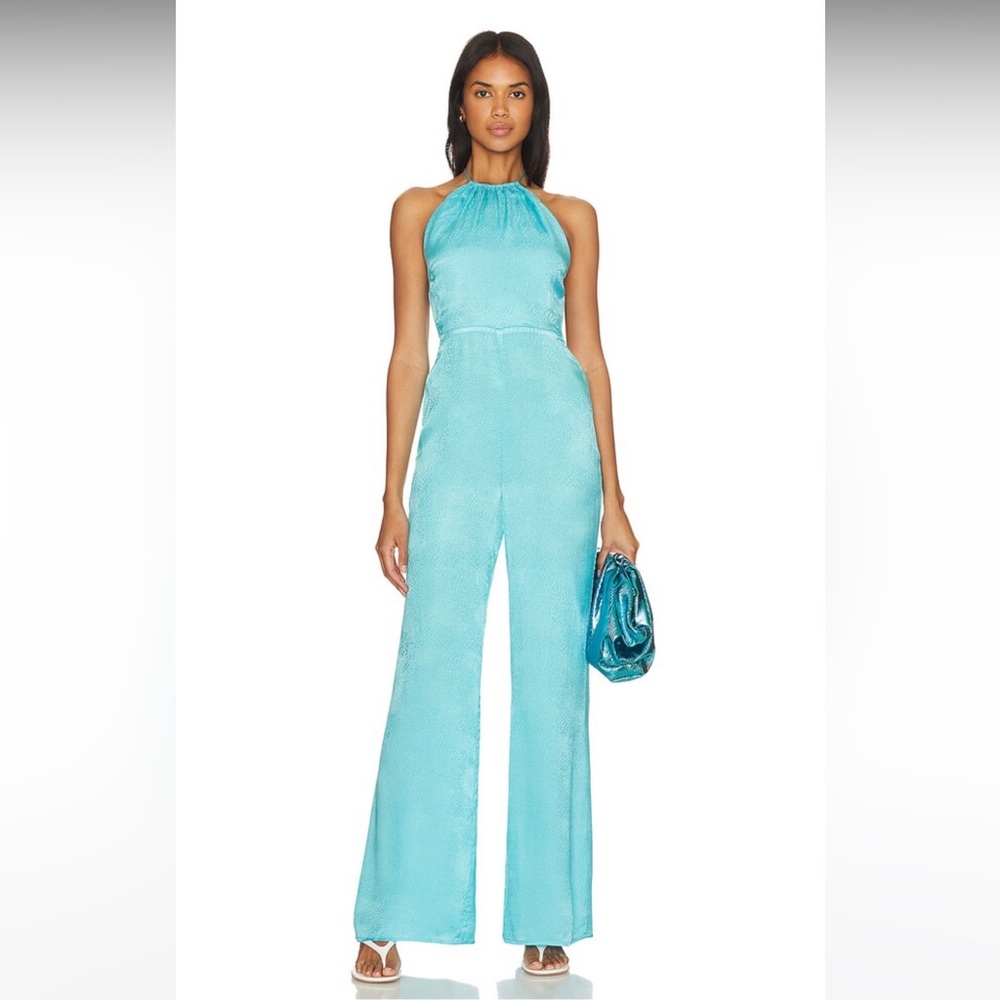 Brand new jumpsuit, size extra small, never worn .